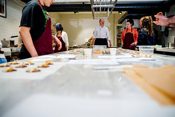 istock Cooking Workshop with Chef – Group Learning and Chocolate Decoration in Professional Kitchen 2208197836