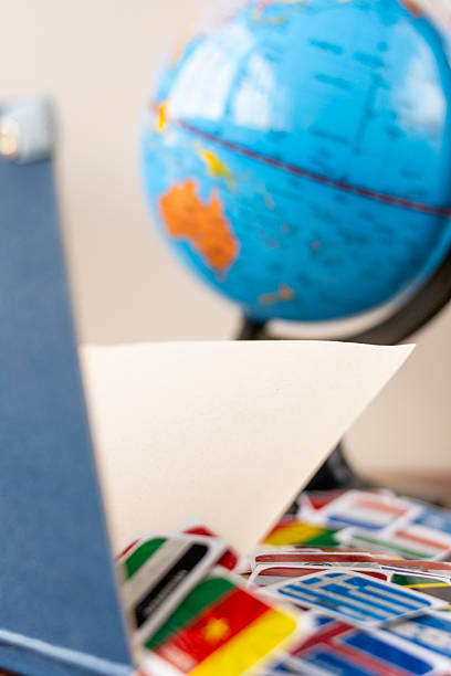istock Symbolic image of a globe and international flags 2208201417