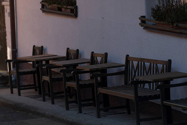 Rows of empty seating at a fast food chain-restaurant.