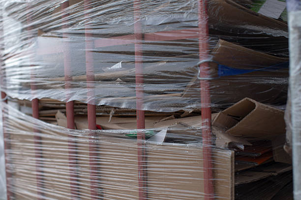 istock Cardboard Boxes Wrapped Up Securely for Storage in the Background Area 2208202235