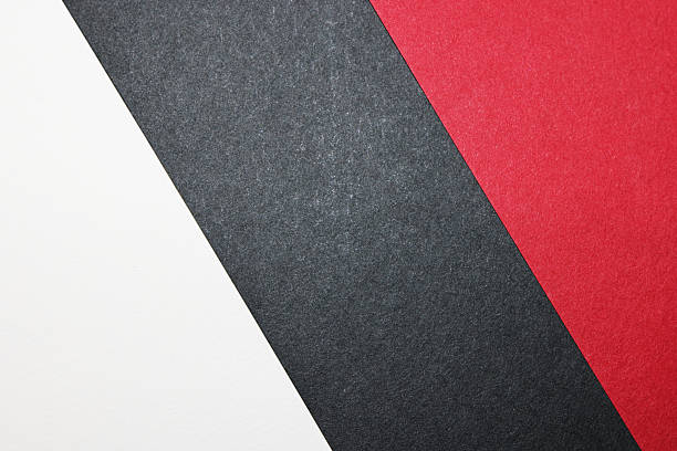 White, black and red paper background.