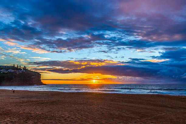 istock Sunrise at the Seaside with rain clouds 2208206287