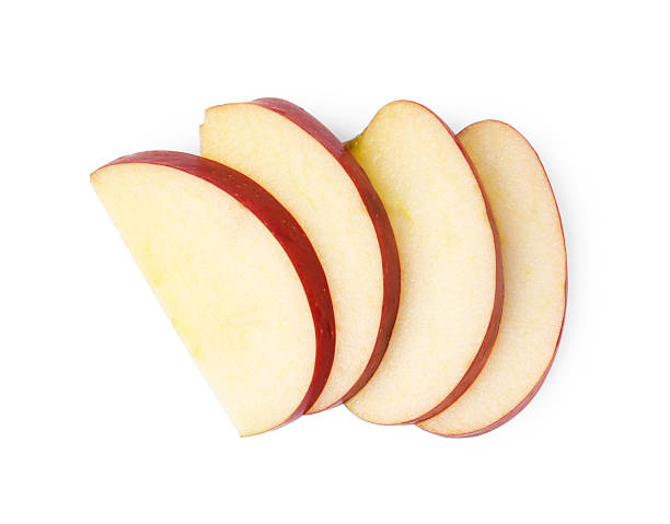 istock Slices of ripe red apple isolated on white, top view 2208211654