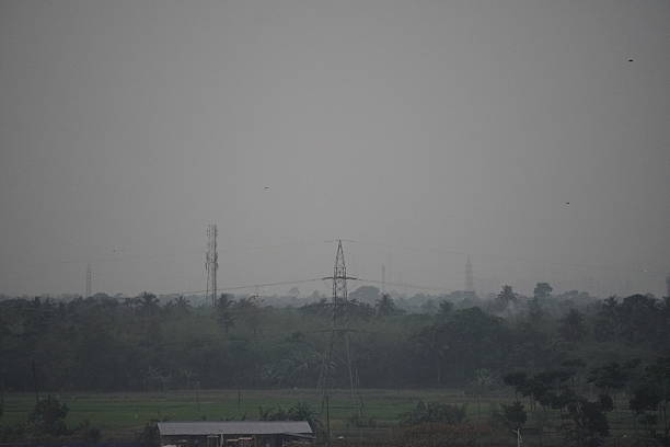 istock The overhead power lines, which are used for transmitting electrical energy over long distances on the empty field 2208228072