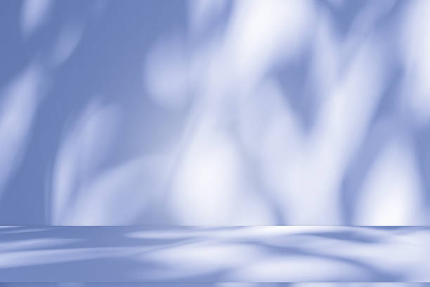 istock Studio style background wall decoration presentation uses white and blue tones. with shadows cast from a nearby window, concept creating a decorative 2208230132