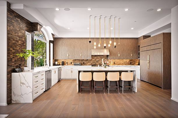 istock Luxury kitchen with island seating, pendant lights, and modern finishes 2208231474