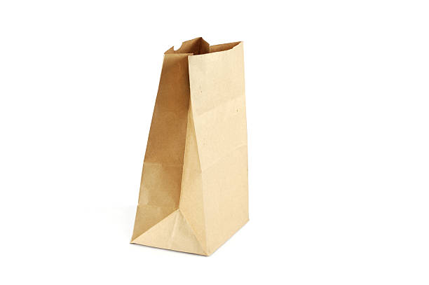 istock recycle brown paper bag isolated on white background 2208234949