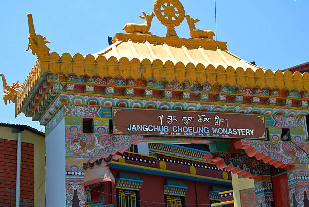 istock This image depicts a vibrant, multi-tiered temple or monastery with bright, contrasting colors and intricate decorative details. 2208238724