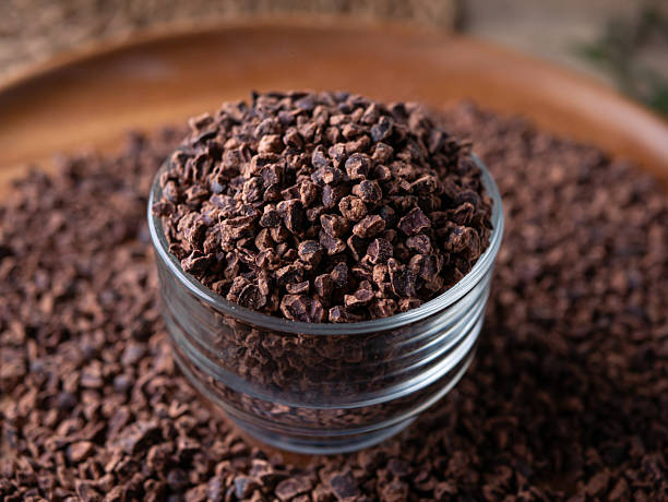 istock close up Organic Cacao nibs or Cacao chips. 2208242670