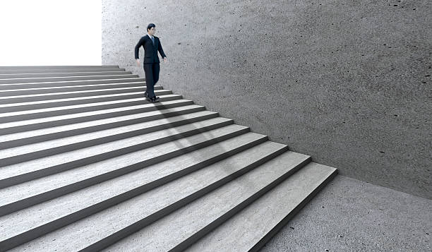 istock businessman walk down stairs. concept business 2208245747