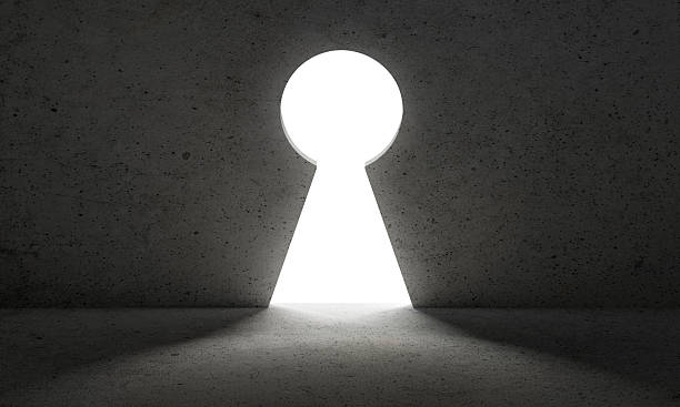 istock Light from Keyhole door. dark wall, business concept 2208245956