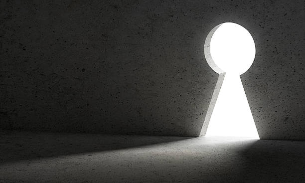 istock Light from Keyhole door. dark wall, business concept 2208245957