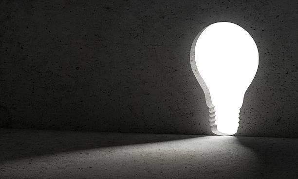 istock Light from light bulb door. dark wall, business concept 2208245959
