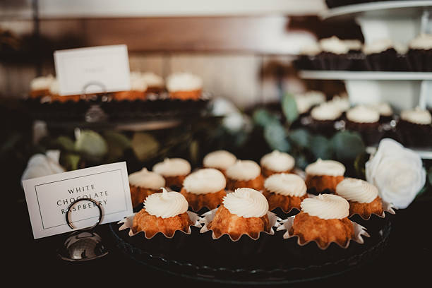 Wedding cake bundt cake cupcakes on dessert table