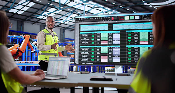 istock Training A Diverse Group Of Warehouse Workers On Supply Chain 2208247622