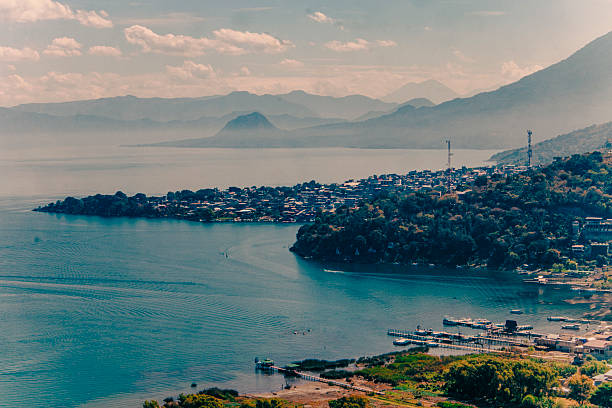 Deep Blue: Lake Atitlan, Guatemala Silhouette of Volcanoes on blue lake