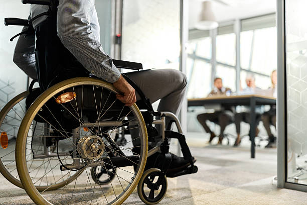 istock Unrecognizable disabled candidate entering on a job interview. 2208248271