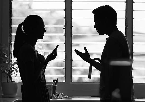 istock Couple talking, having conversation at home.  People discussing domestic issues, argument, working out problems. 2208248691