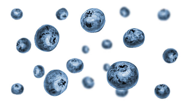 istock Splash blueberries in air. falling fruit isolated on white bg 2208254778