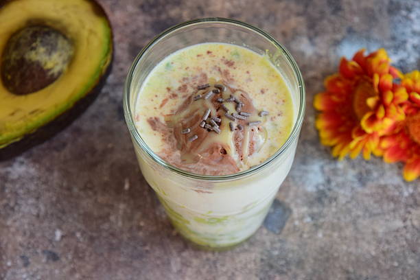 Mashed avocado with milk, chocolate ice cream, condensed milk and chocolate sprinkles