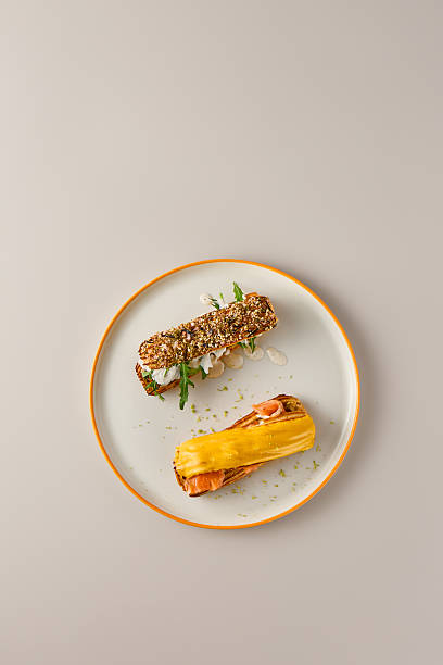 Elegant Plated Gourmet Pastries on Minimalist Background with Subtle Lighting