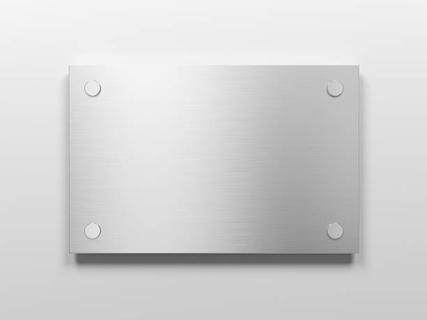 istock Blank brushed metal nameplate isolated on light gray background. Copy space. 2208265893