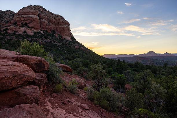 istock Sedona red rocks at sunset with lush greenery. 2208267699