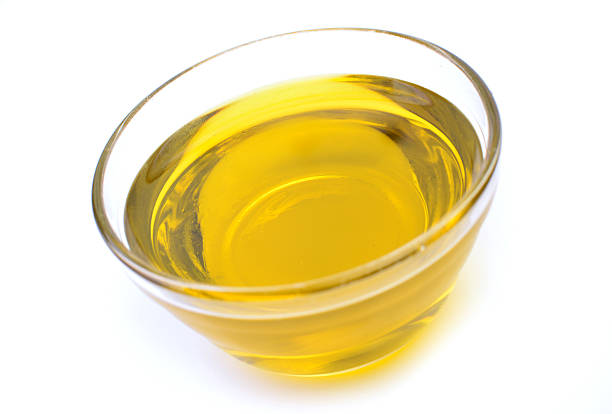 istock Olive oil on a white background 2208270038