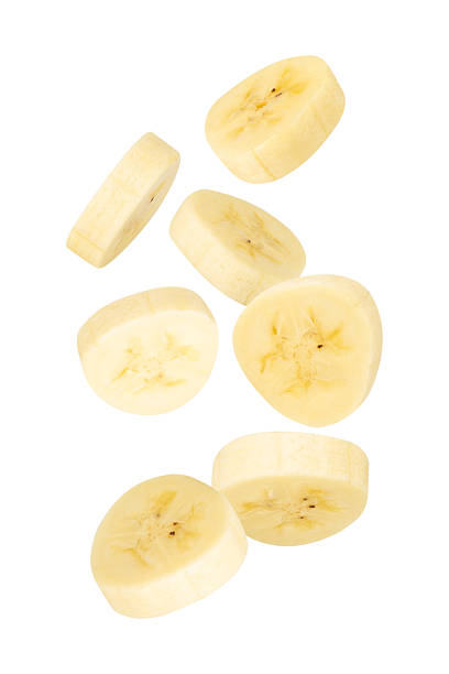 istock Falling Banana Slices isolated on white background with clipping path, full depth of field 2208276971