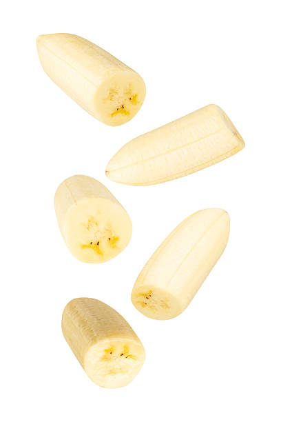 istock Falling Banana Slices isolated on white background with clipping path, full depth of field 2208276980