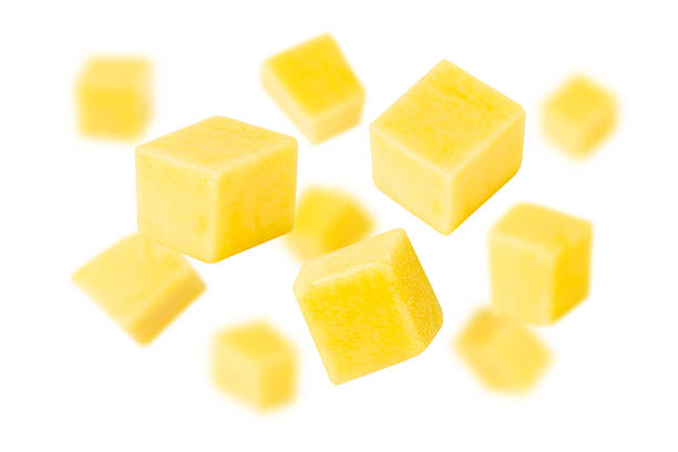 istock Falling Yellow Mango slices isolated on white background with clipping path, full depth of field 2208277100