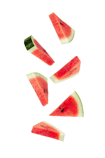 istock Falling Watermelon slices isolated on white background with clipping path, full depth of field 2208277426
