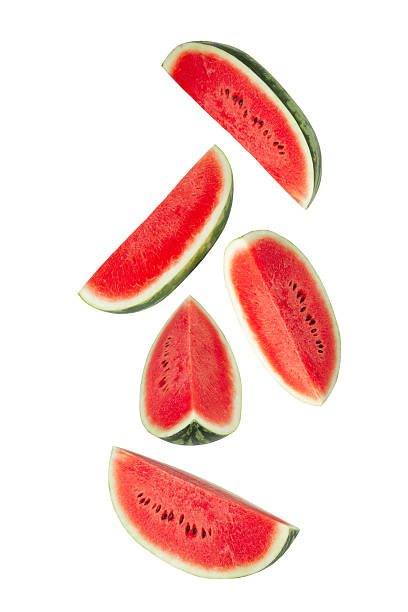 istock Falling Watermelon slices isolated on white background with clipping path, full depth of field 2208277429