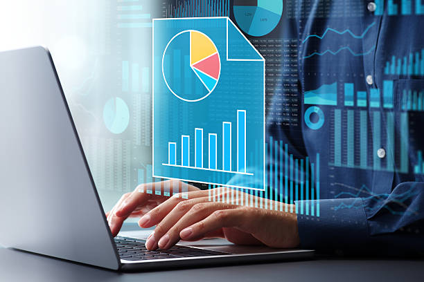 istock Spreadsheet calculations and applications. Data tables and graphs. Businessman using laptop computer for spreadsheet software. 2208284417