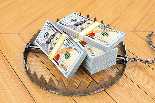 istock Money Trap Concept US Dollars on Animal Trap 2208285786