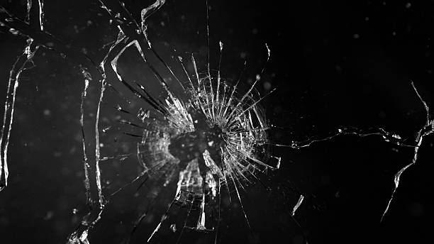 istock Texture of broken glass with cracks. 2208287238