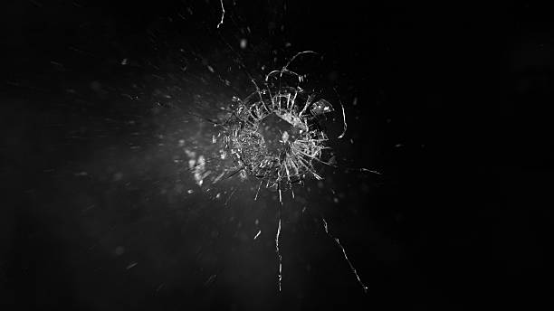 istock Texture of broken glass with cracks. 2208287298