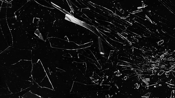istock Texture of broken glass with cracks. 2208287307