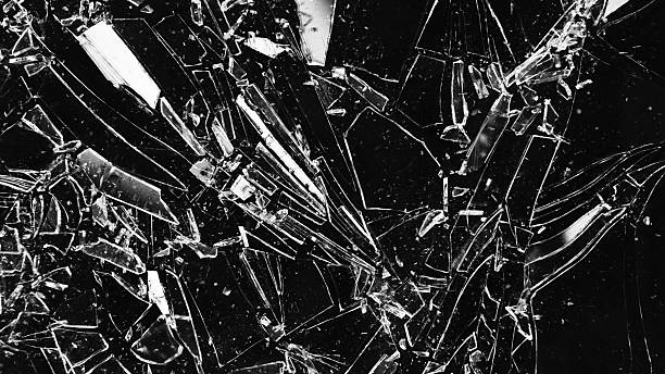 istock Texture of broken glass with cracks. 2208287336