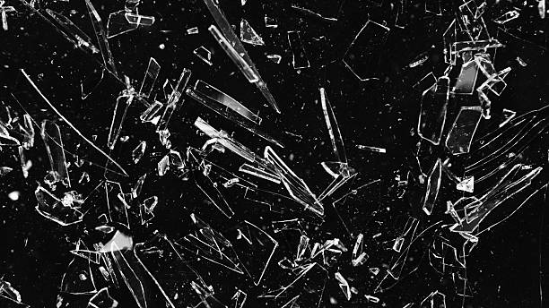 istock Texture of broken glass with cracks. 2208287414