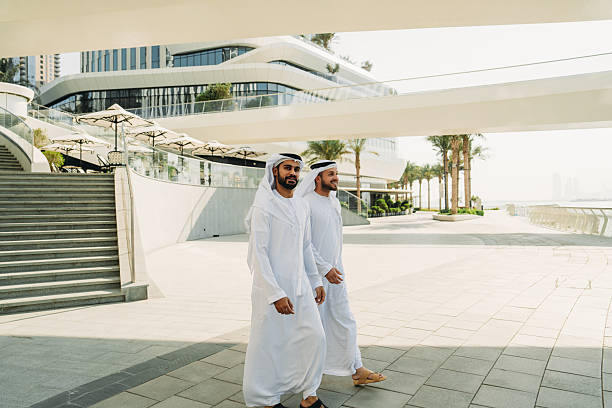 istock Arab businessmen walking in Dubai 2208295041