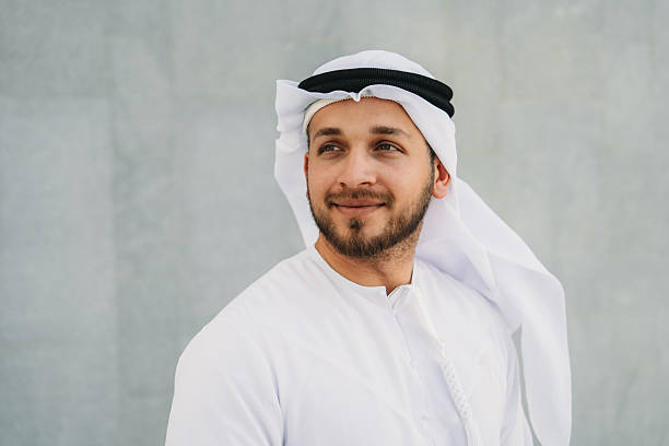 istock Emirati businessman looking away and smiling 2208295089