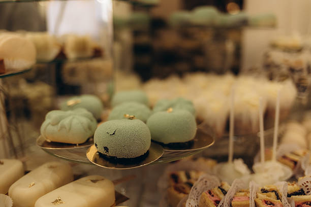 istock Elegant Dessert Display Featuring Delicate Treats and Light Blue Confections 2208307181