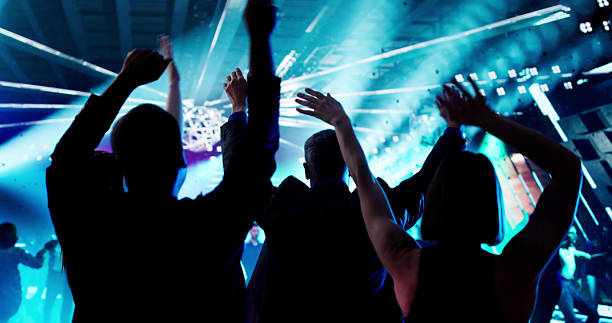 istock Nightclub Crowd Silhouettes Dance 2208308751