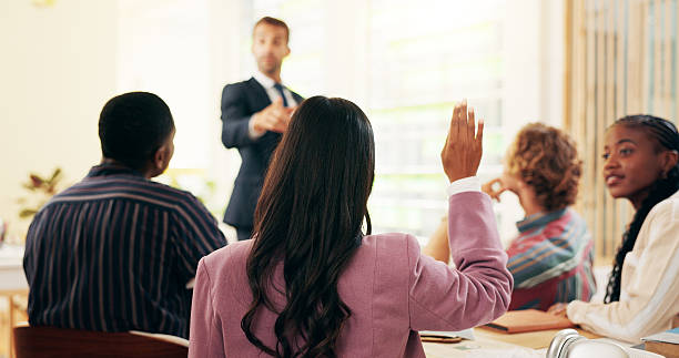 istock Mentor, question and meeting with business people in office for internship program, training and learning. Advisor, collaboration and help with group of employees in agency for coaching and feedback 2208314620