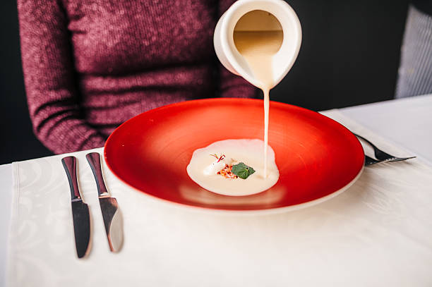 Soup for dinner, with delicious ingredients above-ground kohlrabi, pancetta and truffle