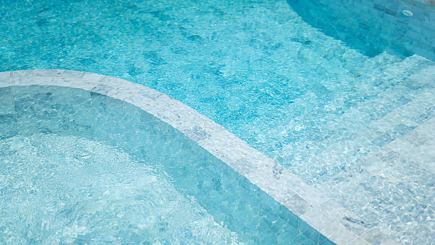 istock Luxury style swimming pool building with white marble floor. 2208317687
