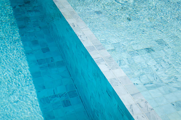 istock Luxury style swimming pool building with white marble floor. 2208317698