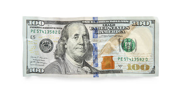 istock One crumpled dollar banknote isolated on white, top view 2208328520