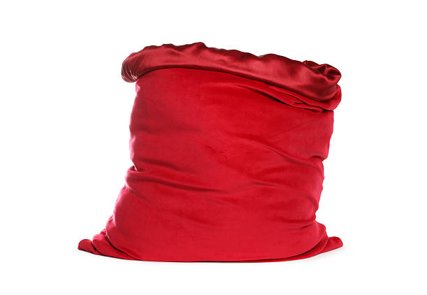 istock One red Santa's bag isolated on white 2208328620